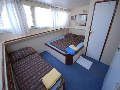 Master cabin with double bed + single bed