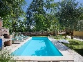 Pool with sun lounges