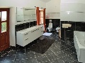 Bathroom with shower and bath