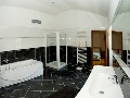 Bathroom with shower and bath