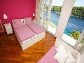 Triple bedroom with sea view and exit to the balcony