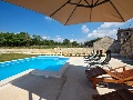 Pool with sun lounges