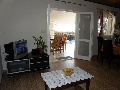 Living room and exit to the balcony in apartment Ruzmarin