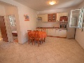 Kitchen and dining room in the ground floor apartment