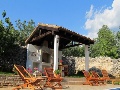 Sun lounges and outdoor kitchen