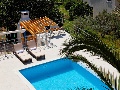 Pool with sun lounges