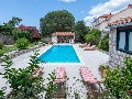 Pool with sun lounges