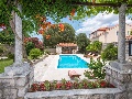 Pool with sun lounges