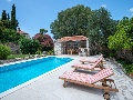 Pool with sun lounges