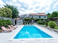 Pool with sun lounges