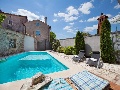 Pool with sun lounges