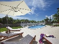 Pool with sun lounges