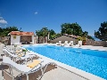 Pool with sun lounges