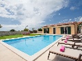 Pool with sun lounges