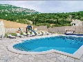 Pool with sun lounges