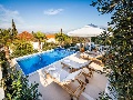 Pool with sun lounges