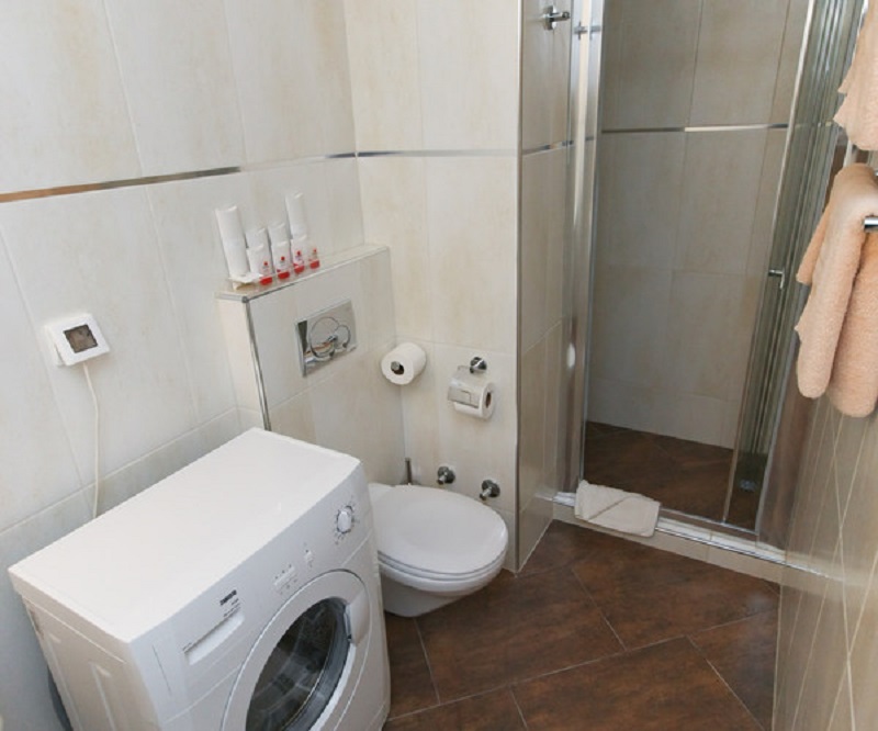 Washing machine inside the bathroom