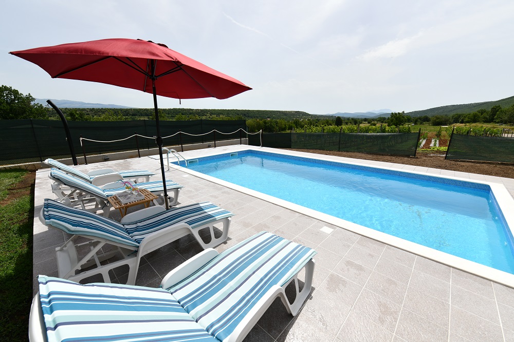 Sun lounges at the swimming pool