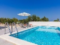 Pool with sun lounges